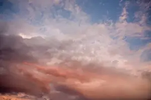 Atmosphere Prints: USA, Oregon, Bend. Salmon-colored clouds dissolve into the evening sky in Bend, Oregon