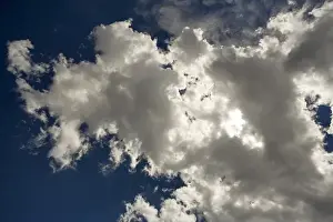 Atmosphere Prints: USA, Oregon, Bend. The sun is filtered through clouds in central Oregon