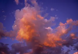 USA, Oregon, Bend. The sunset colors clouds pink in the Central Oregon sky