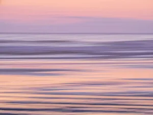 USA, Oregon, Cannon Beach and a dreamy view of the beach at low tide at sunset