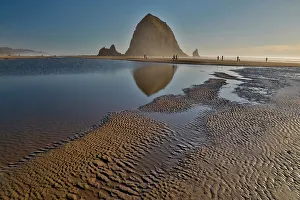 Sea Stack Prints: USA, Oregon. Cannon Beach with Haystack near sunset and low tide
