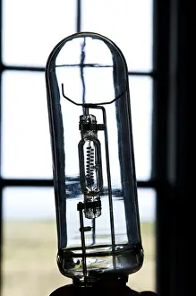 Bulb Prints: USA, Oregon, Cape Blanco. A silhouette of a light bulb used in the lighthouse. Credit as