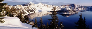 Snowcapped Prints: USA, Oregon, Crater Lake National Park, View of snow covered mountains with Crater lake