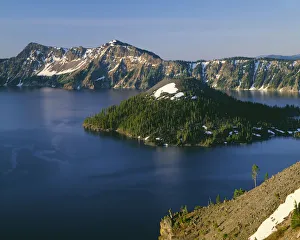 USA, Oregon. Crater Lake National Park, sunrise on Crater Lake and Wizard Island