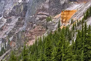 Pumice Prints: USA, Oregon, Crater Lake NP. Orange pumice rock eroded to form the Pumice Castle