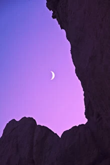 Images Dated 17th August 2007: USA, Oregon. Crescent moon framed by sea stacks at twilight
