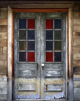 Damaged Prints: USA, Oregon, Deschutes County. Old weathered doors with stained-glass windows