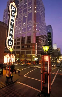 Images Dated 5th July 2006: USA, Oregon, Portland, Cars streak by the Arlene Schnitzer Concert Hall and the Fox Tower