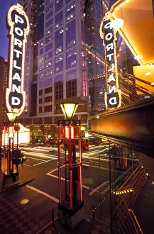 Images Dated 5th July 2006: USA, Oregon, Portland, Cars streak by the Arlene Schnitzer Concert Hall, the Portland