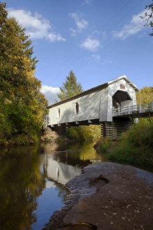 USA, Oregon, Scio, Hoffman Bridge across Crabtree Creek in early Autumn. Digital Composite