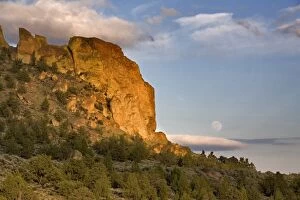 USA, Oregon, Smith Rocks SP. A full moon rises above the east side of Smith Rocks