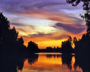 Images Dated 10th January 2013: USA, Oregon. Sunset reflecting in Columbia Slough. Credit as: Steve Terrill / Jaynes