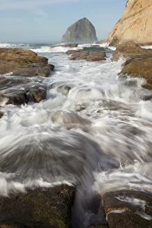 View From Below Prints: USA, Oregon. Waves in front of Haystack Rock, Cape Kiwanda State Park