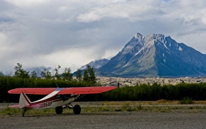 Largest Prints: USA, Pacific Northwest, Alaska, Wrangell-St. Elias National Park. Small plane waits