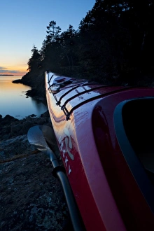 Images Dated 22nd April 2010: USA, San Juan Islands, Washington. Sea kayak ashore on Jones Island at sunset