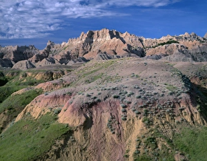 South Dakota Prints: USA, South Dakota, Badlands National Park, North Unit, Pinnacles rise above grass