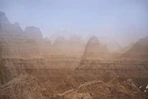 South Dakota Prints: USA, South Dakota. Fog in Badlands National Park. Credit as
