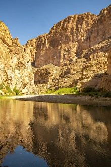 Images Dated 22nd June 2024: USA, Texas, Big Bend National Park. Chisos Mountains and Rio Grande River reflection