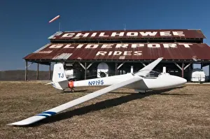 Air Plane Prints: USA, TN, Chilhowee Gliderport. Fiberglass sailplane in front of barn shed. (PR)