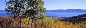 Ric Ergenbright Prints: USA, Utah, Bear Lake. The deep blue of Utahs Bear Lake contrasts with autumn foliage