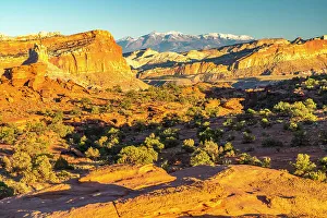 Images Dated 4th October 2022: USA, Utah, Capitol Reef National Park. Eroded rock formations and mountains