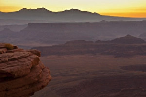 Images Dated 28th October 2011: USA, Utah, Dead Horse Point State Park. Misty sunrise over rock formations. Credit as