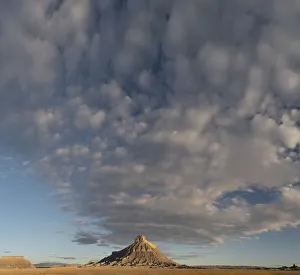 Images Dated 21st January 2020: USA, Utah. Early morning clouds at Factory Butte, Upper Blue Hills