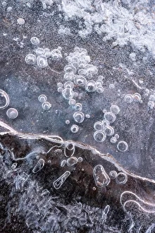 Ice Bubble Prints: USA, Utah. Ice bubble formations Arches National Park