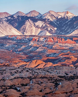Images Dated 2025: USA, Utah, Moab. Arches National Park, La Sal Mountains at sunset in winter