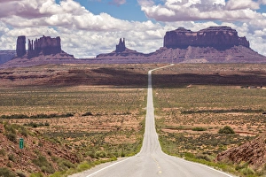 USA, Utah, Monument Valley Navajo Tribal Park. Road through park landscape. Credit as