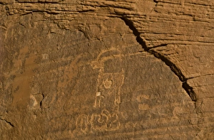 Images Dated 30th April 2009: USA, Utah, Monument Valley Navajo Tribal Park. Ancient petroglyphs carved on rock wall