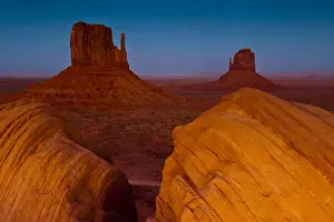 USA, Utah. Sunset on Mitten Buttes at Monument Valley Navajo Tribal Park. Credit as