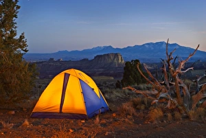 Images Dated 12th March 2007: USA, Utah. A tent glowing at dusk on the San Rafael Swell
