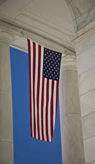 USA, VA, Arlington. American Flags are hung around the Ampitheater located adjacent