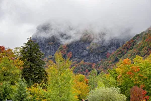 Vermont Prints: USA, Vermont, New England, Stowe Mt. Mansfield parking lot view with fog on mountains