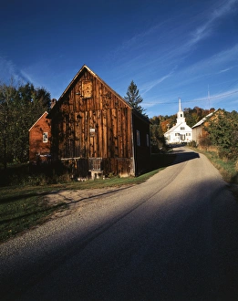USA, Vermont, Northeast Kingdom, Waits River, View of church and barn in autumn