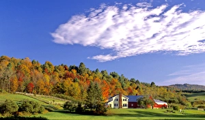 October Prints: USA, Vermont, Waitsfield. A farm is lit by the evening sun