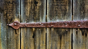 Cabin Prints: USA, Virginia, Roanoke, Explore Park. Detail of rusty barn door brace. Credit as