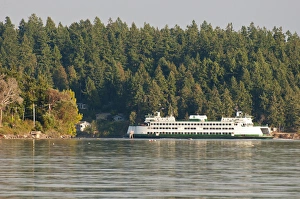 Images Dated 26th September 2012: USA, WA, Bainbridge Island. Ferry navigates through Rich Passage enroute from Bremerton