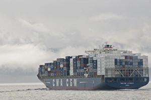 Ferry Prints: USA, WA, Laden container ship moves through Strait of Juan de Fuca with fog and clouds