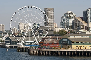 Images Dated 13th September 2012: USA, WA, Seattle. Dramatic downtown waterfront with new Seattle Great Wheel on Pier 57