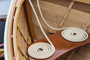 Rope Prints: USA, Washington. Coiled line in wooden boat at the Bainbridge Island Wooden Boat Festival