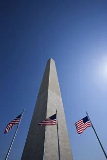 Images Dated 23rd April 2007: USA, Washington, D.C. American flags at the Washington Monument