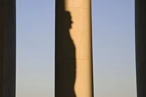 USA, Washington, D.C. The shadow of Thomas Jefferson on a column inside the Jefferson Memorial