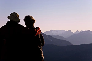 Women Prints: USA, Washington, Mount Baker. Two women view mountain scenery in Snoqualmie National Forest