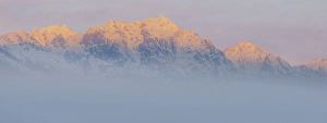 USA, Washington, Mount Constance. Foggy sunrise panorama of mountain