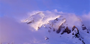Snowcapped Prints: USA, Washington, Mt Rainer National Park, Clouds wrapped summit of Mt Rainer