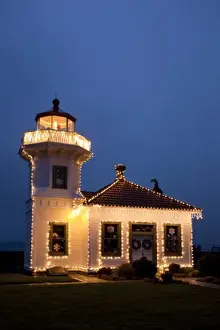 1906 Prints: USA, Washington, Mukilteo. Mukilteo Lighthouse with holiday lights. Constructed in 1906