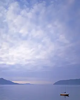 Charles Gurche Prints: USA, Washington, Orcas Island, Sailboat at dawn in Doe Bay