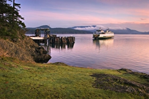 USA, Washington, San Juan Islands. A ferry at the Lopez Island dock at sunrise